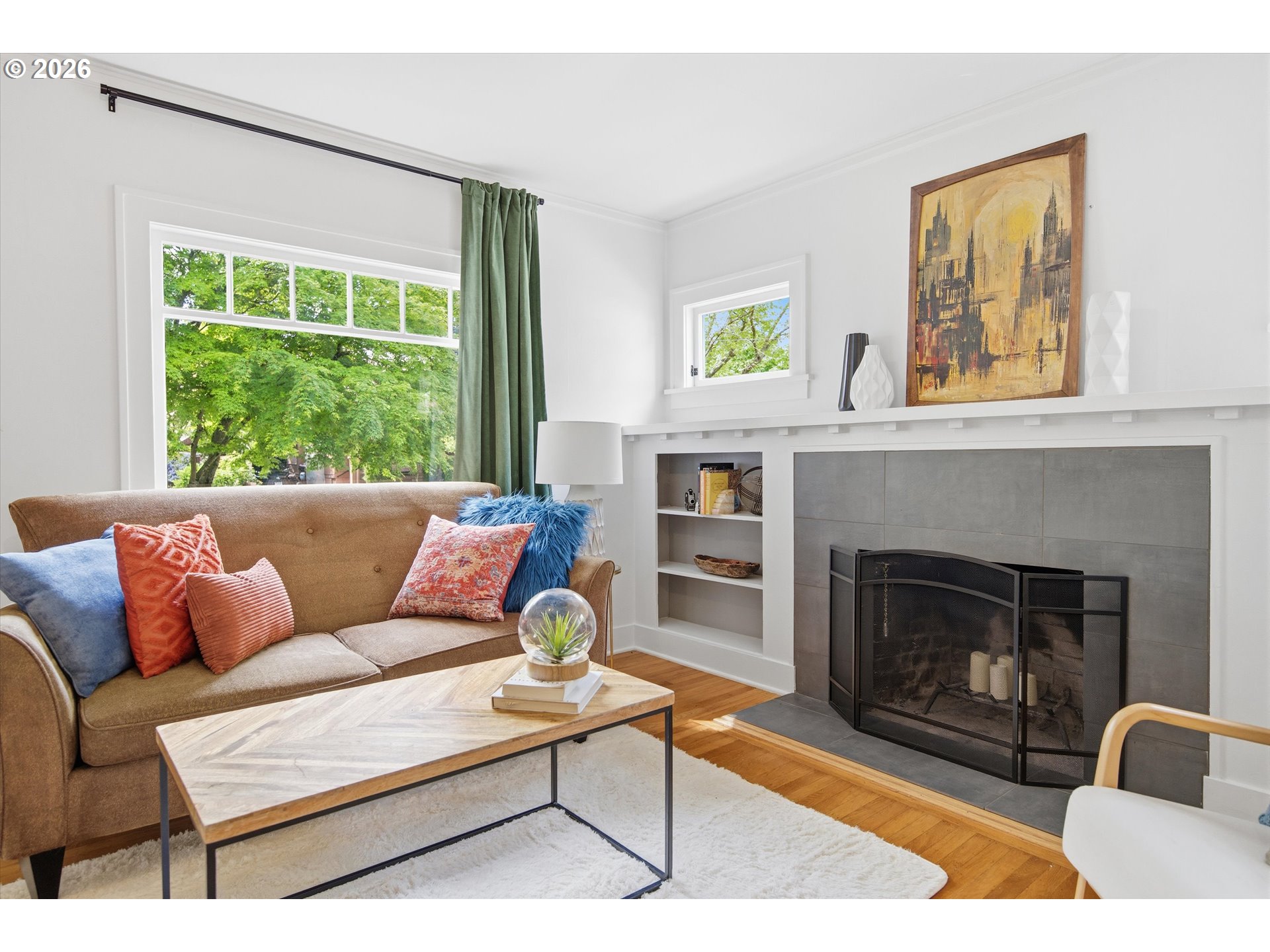 1934 Northeast 55th Avenue Portland, OR 97213 - Photo 6 of 23 a living room with furniture a window and a fireplace