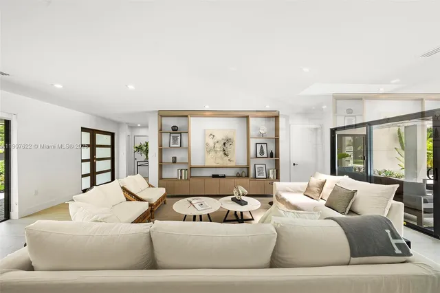 a kitchen that has a sink and a stove