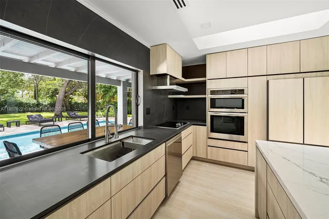 a bedroom with a bed and a painting