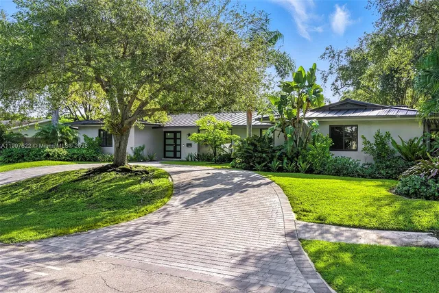a view of a garden with pathway