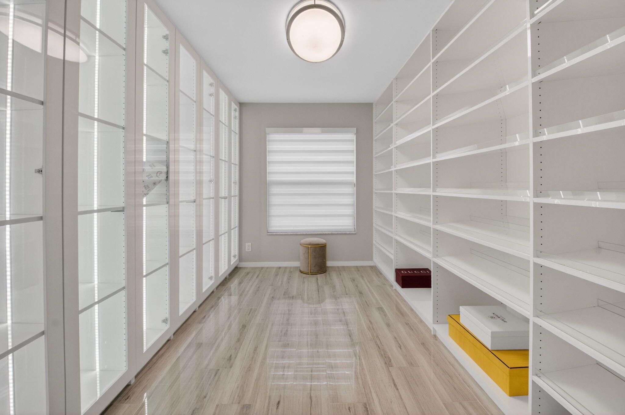 2871 Northwest 49th Street Boca Raton, FL 33434 - Photo 26 of 60 a view of a bedroom with wooden floor and closet