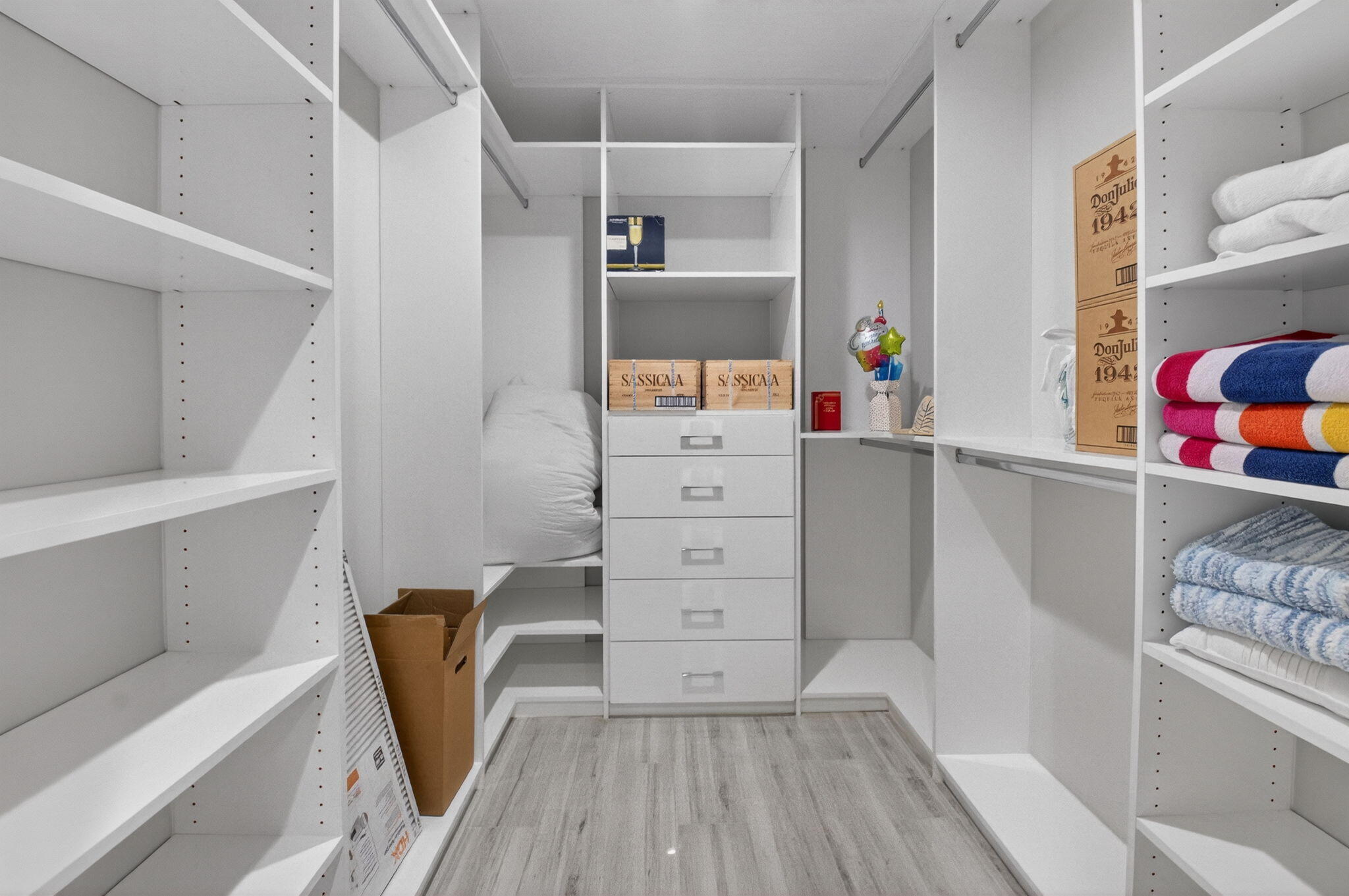 2871 Northwest 49th Street Boca Raton, FL 33434 - Photo 37 of 60 a view of walk in closet with clothes and shoes