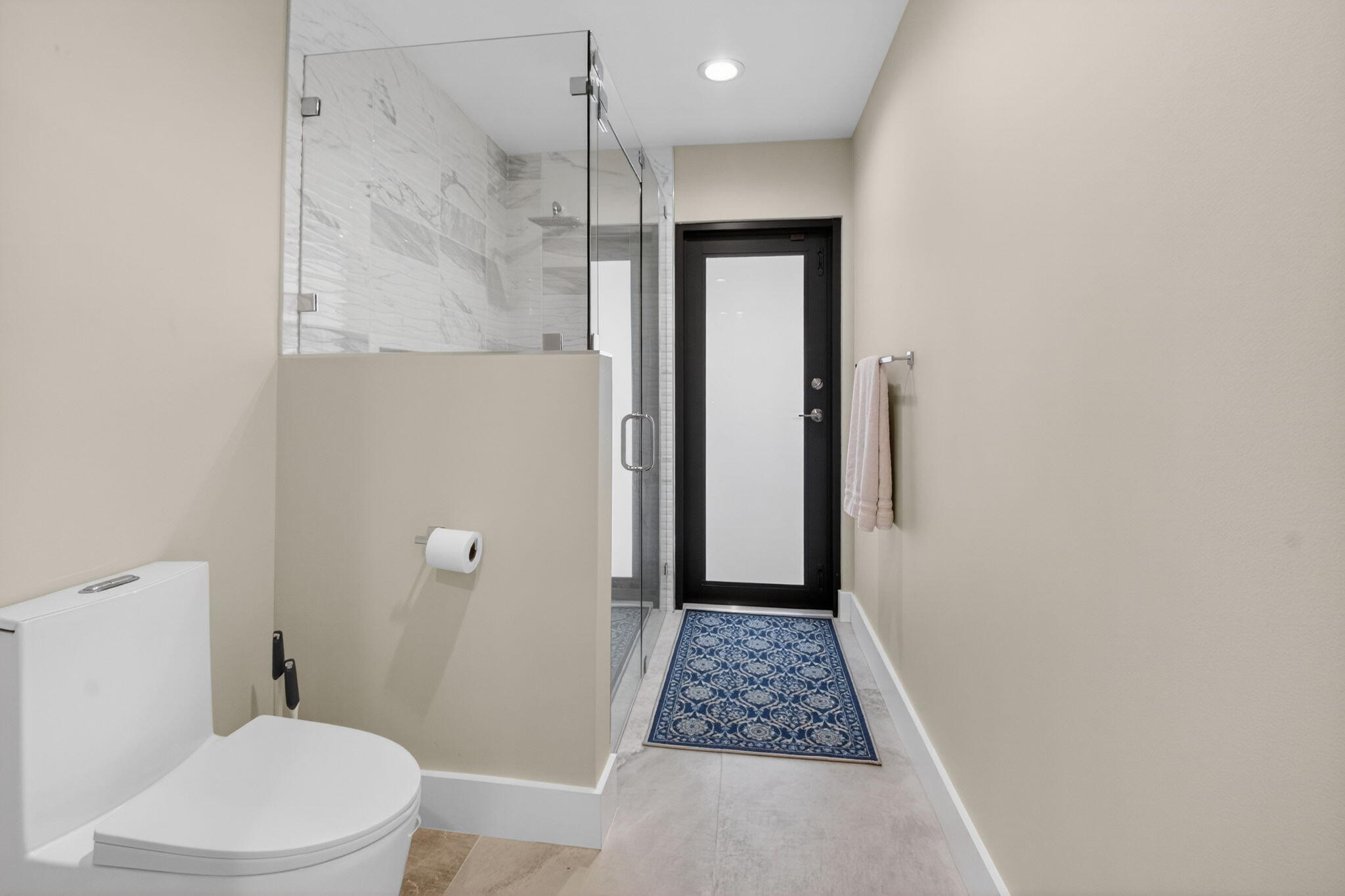 2871 Northwest 49th Street Boca Raton, FL 33434 - Photo 44 of 60 a bathroom with a shower and a toilet