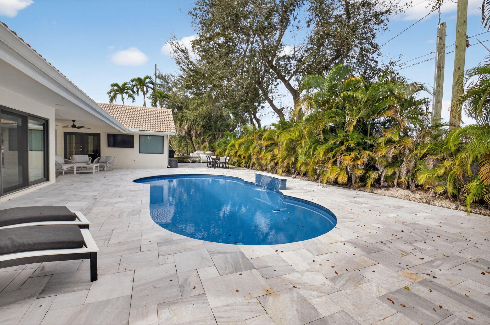2871 Northwest 49th Street Boca Raton, FL 33434 - Photo 48 of 60 a view of outdoor space yard and swimming pool