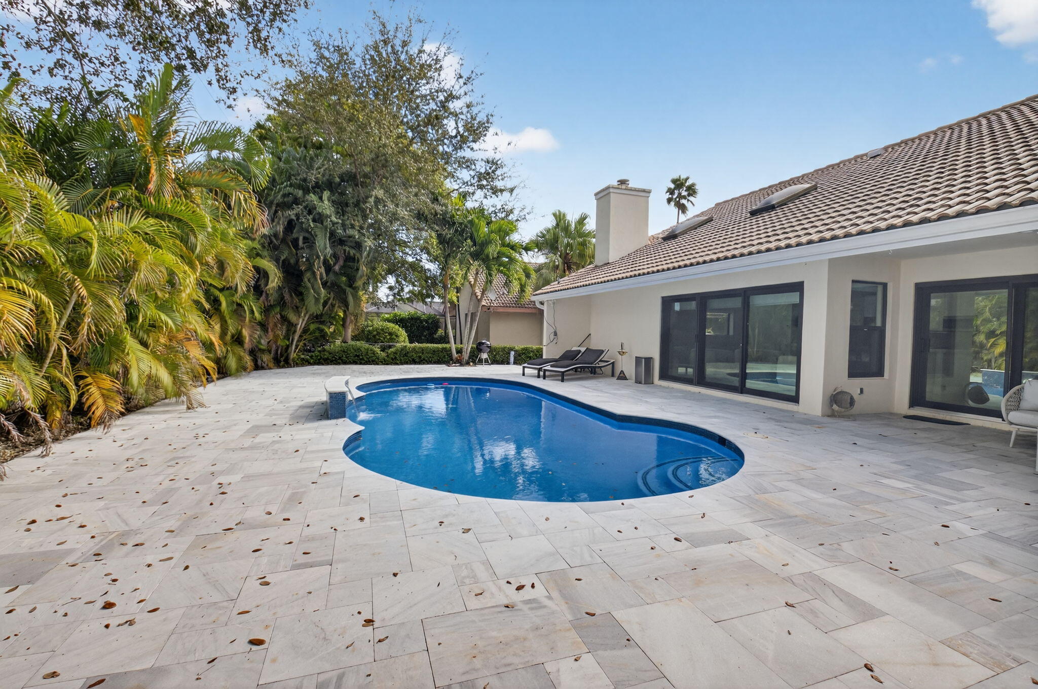 2871 Northwest 49th Street Boca Raton, FL 33434 - Photo 50 of 60 a view of outdoor space yard and swimming pool