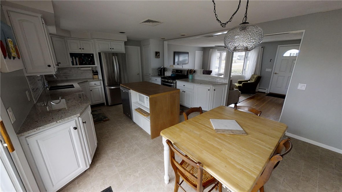5 Quail Hollow Road Cranston, RI 02920 - Photo 12 of 36 Stainless appliances are very young, and will remain.