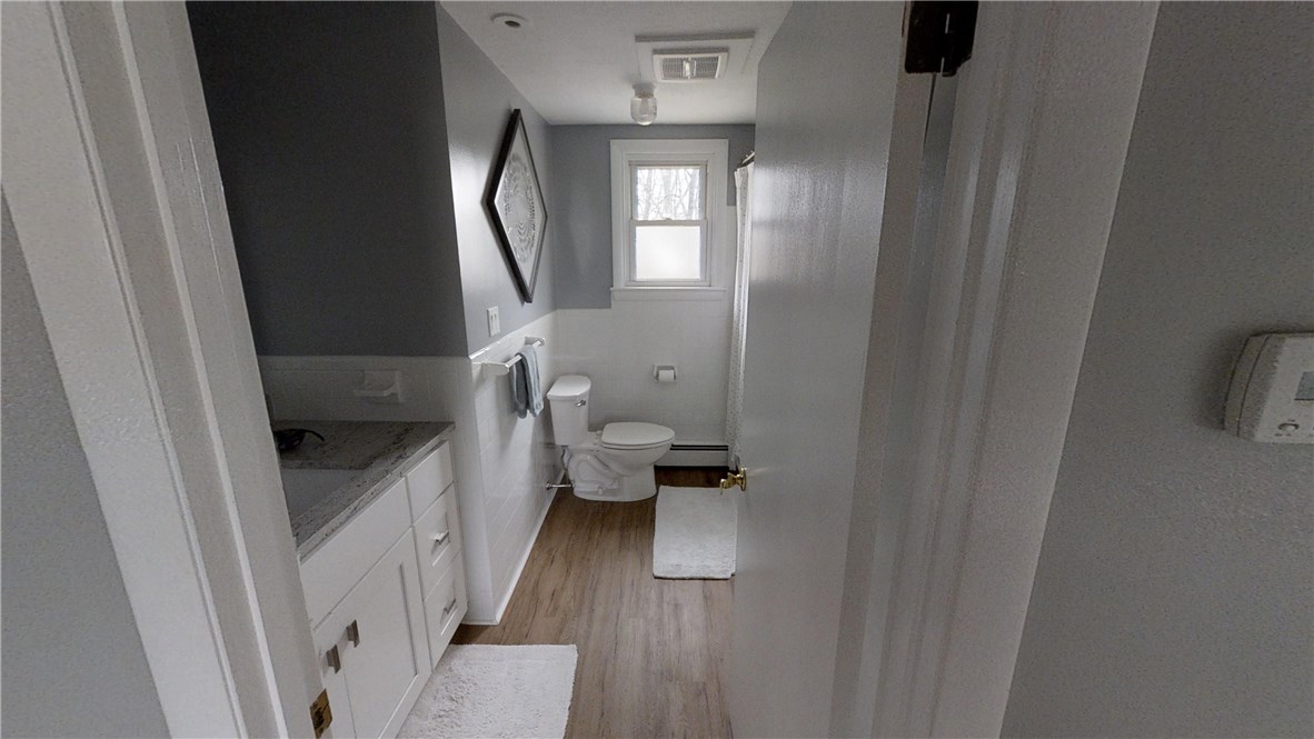 5 Quail Hollow Road Cranston, RI 02920 - Photo 27 of 36 Bathroom has been updated with new flooring, vanity, granite, more!