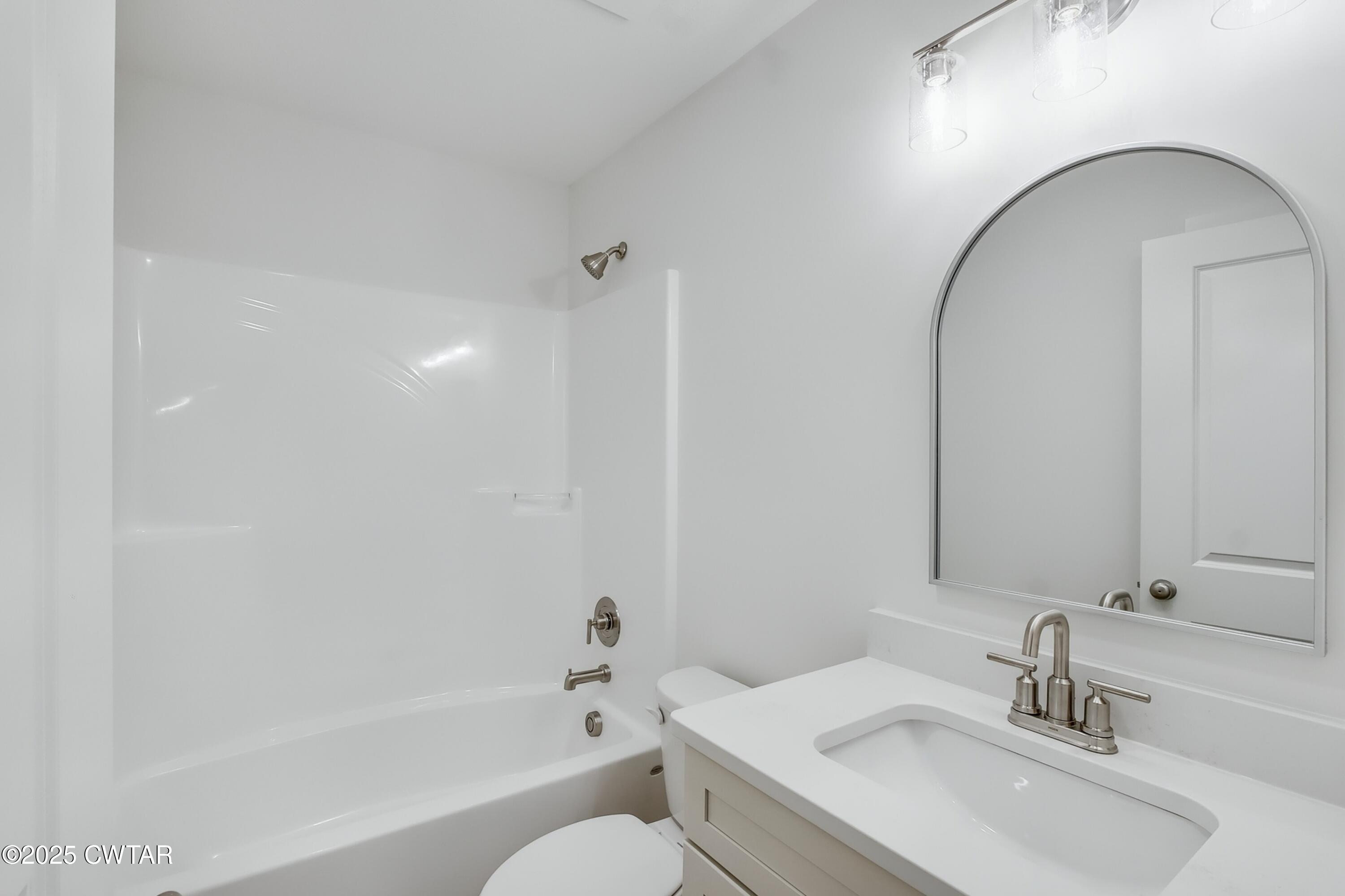 110 Daybreak Loop Medina, TN 38355 - Photo 17 of 21 a bathroom with a sink and a mirror