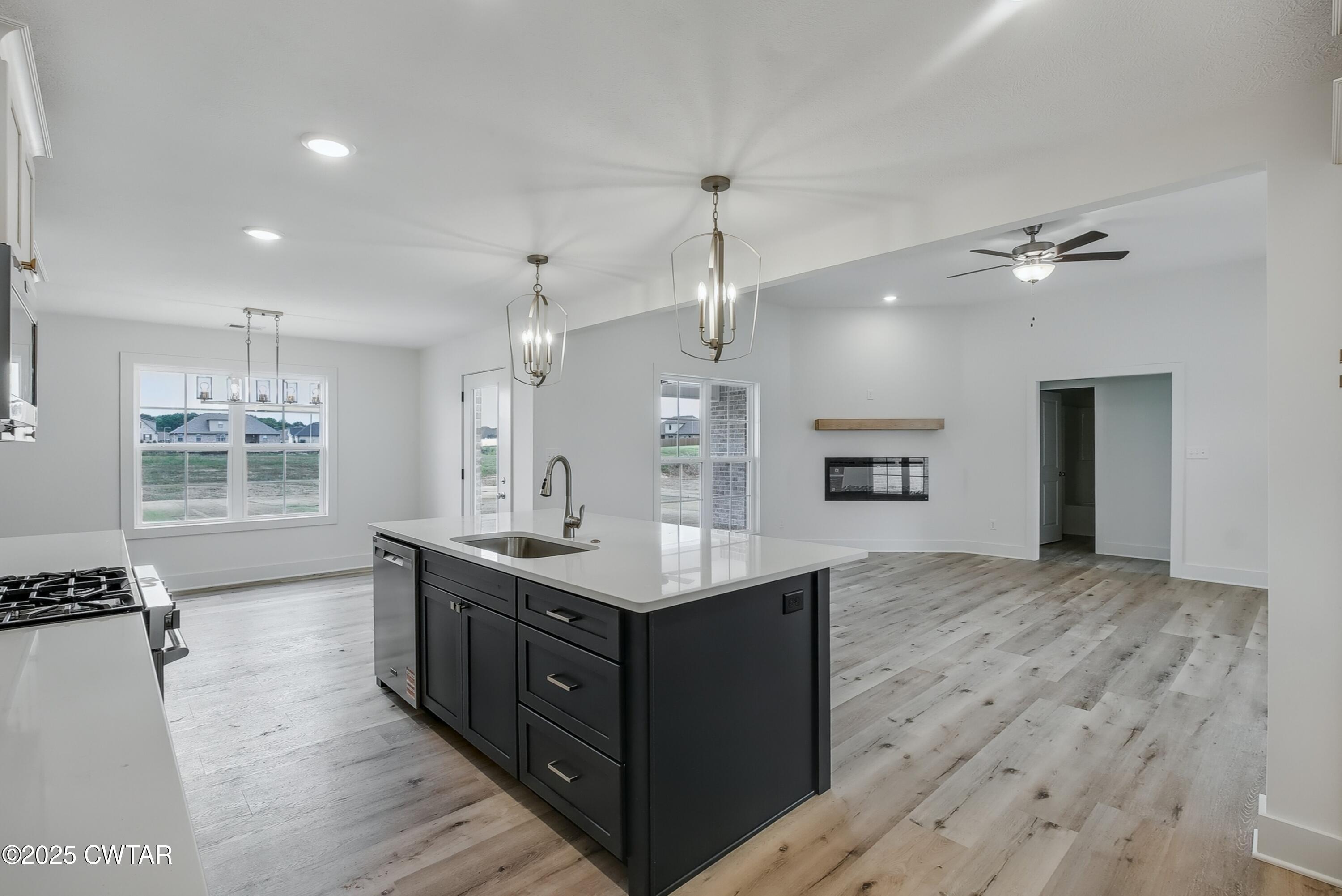 110 Daybreak Loop Medina, TN 38355 - Photo 5 of 21 a spacious bathroom with a granite countertop sink a mirror and a shower