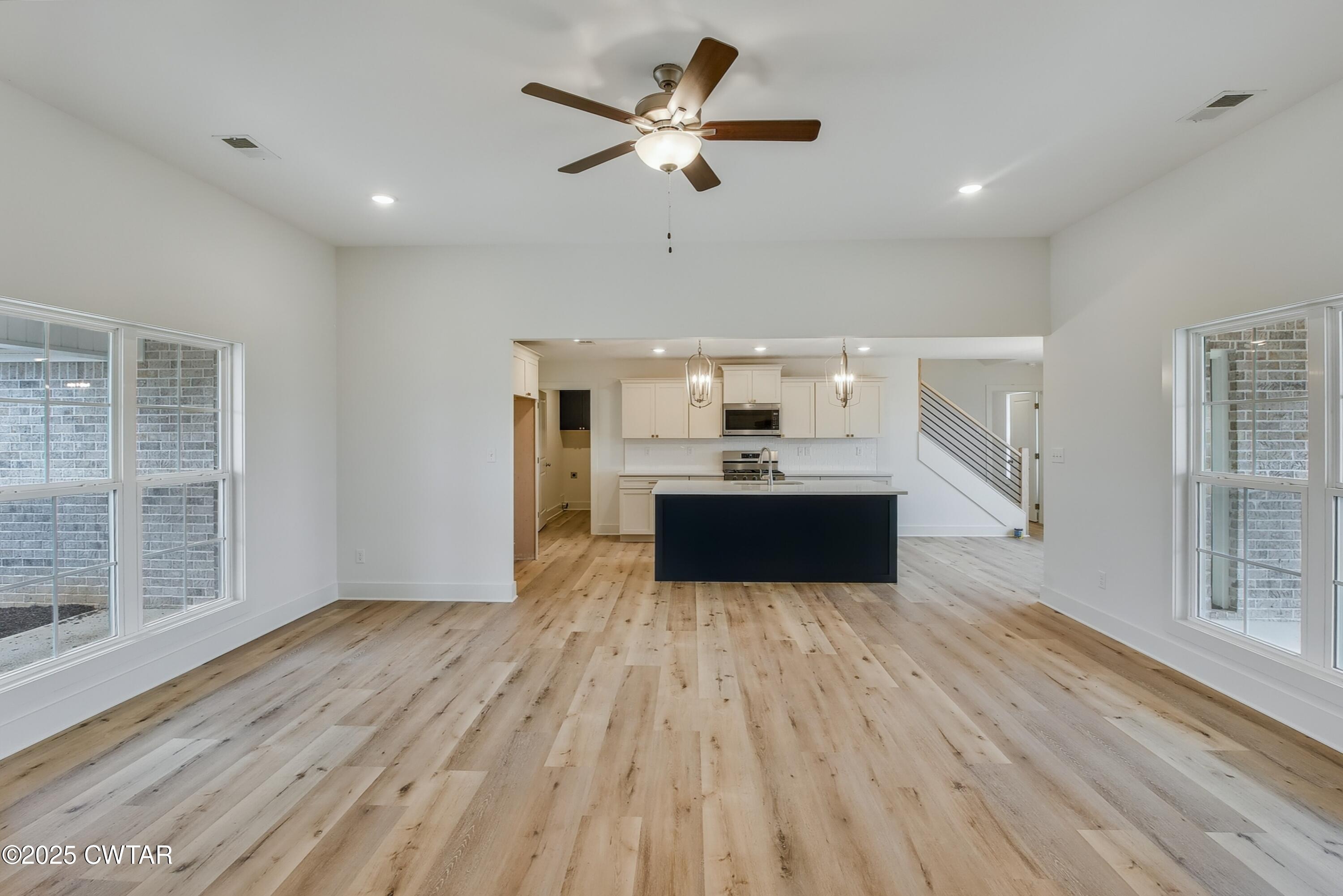 110 Daybreak Loop Medina, TN 38355 - Photo 9 of 21 a view of a kitchen with microwave and furniture