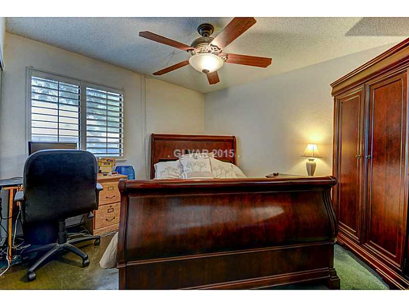 5821 Smoke Ranch Road, Unit D Las Vegas, NV 89108 - Photo 13 of 18 Master Bedroom.