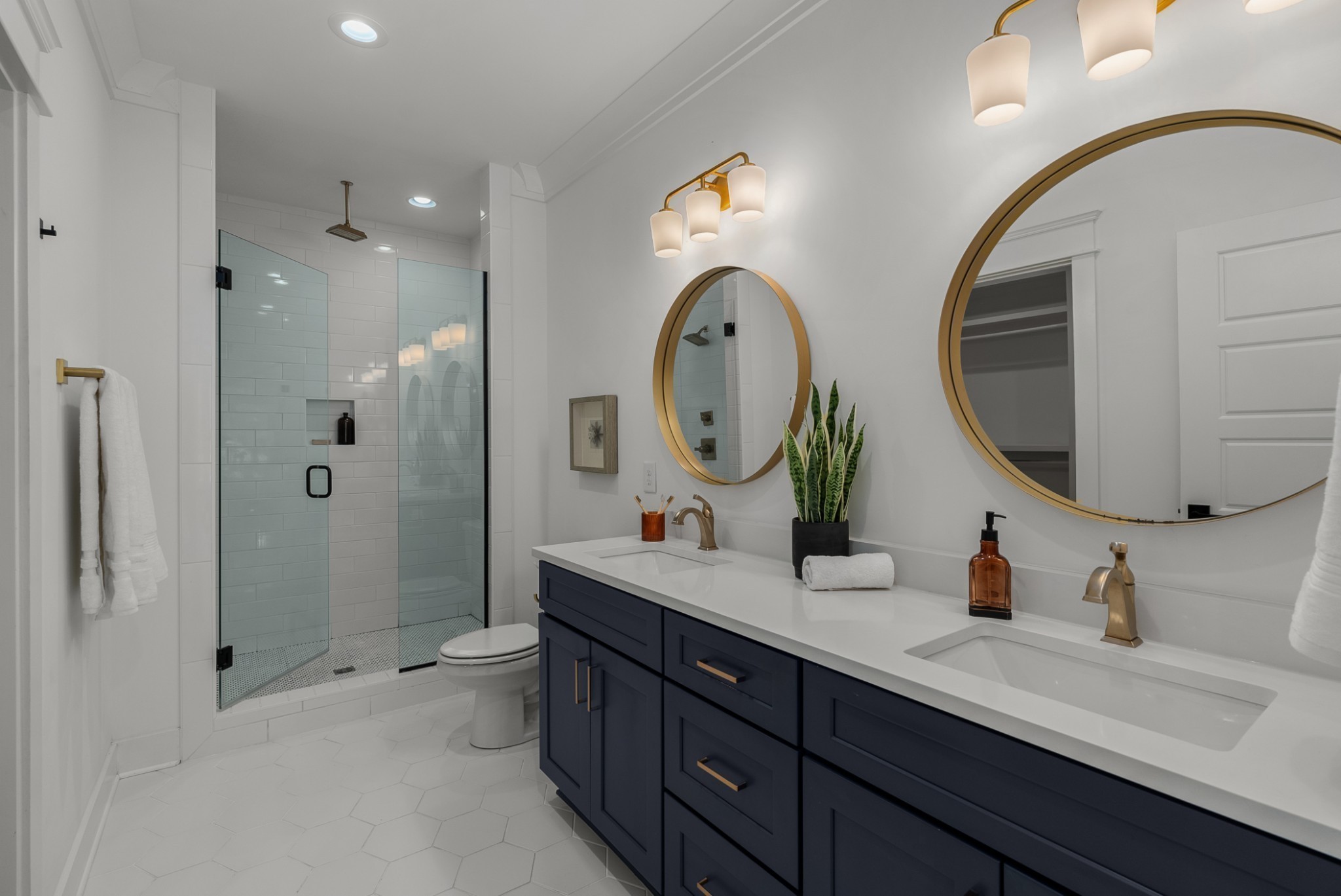 1408 Lischey Avenue, Unit C Nashville, TN 37207 - Photo 15 of 29 a bathroom with a double vanity sink mirror and shower