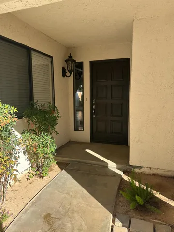 a view of house with garage