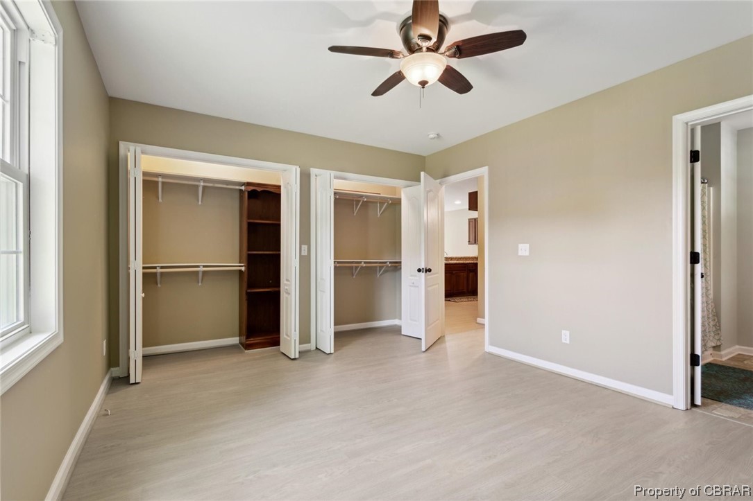 6922 Belroi Road Gloucester, VA 23061 - Photo 16 of 30 Primary Bedroom has 2 closets.
