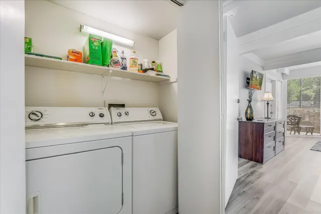 a utility room with dryer and washer