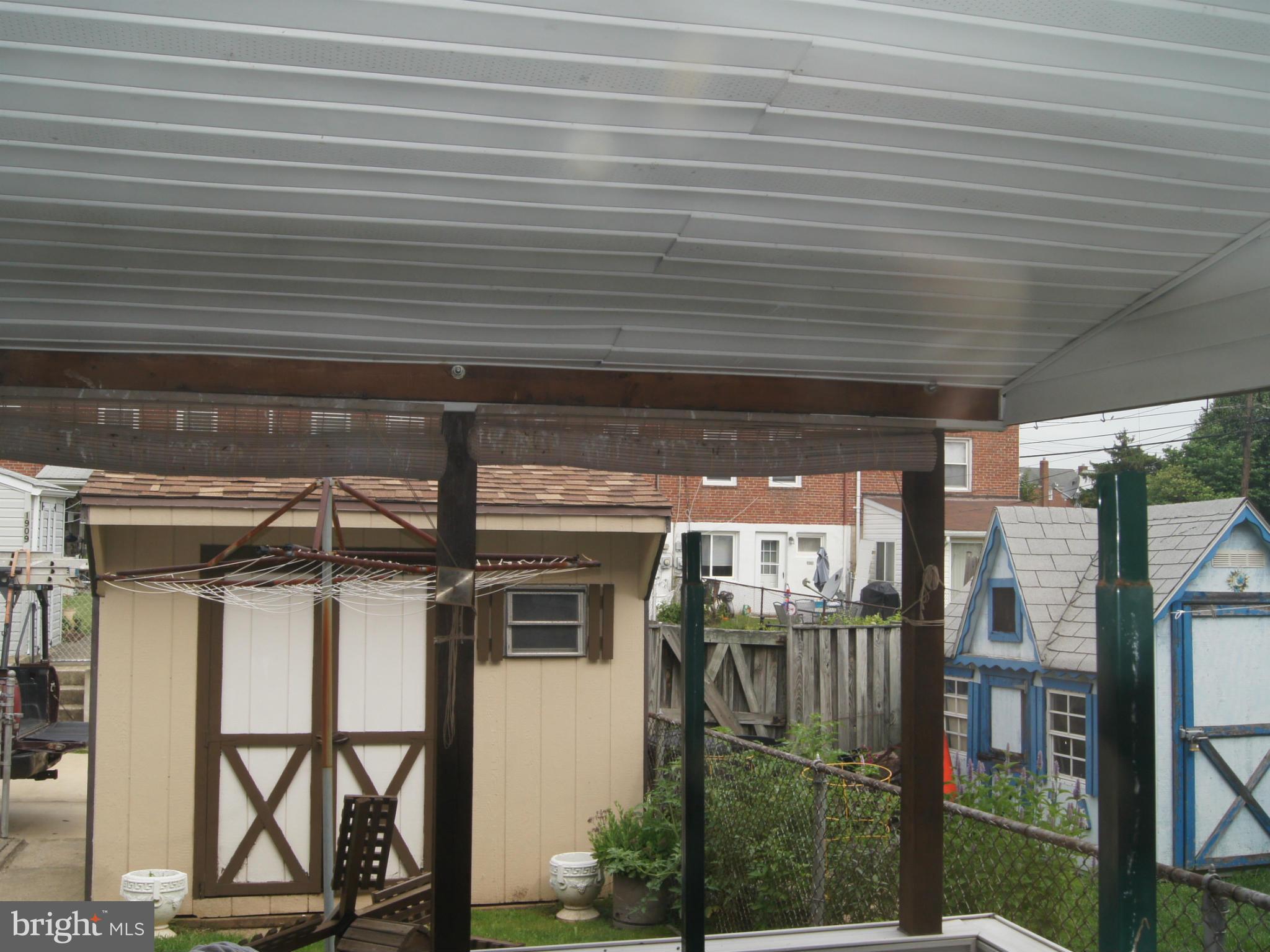 1906 Searles Road Baltimore, MD 21222 - Photo 12 of 13 a view of a porch with wooden floor