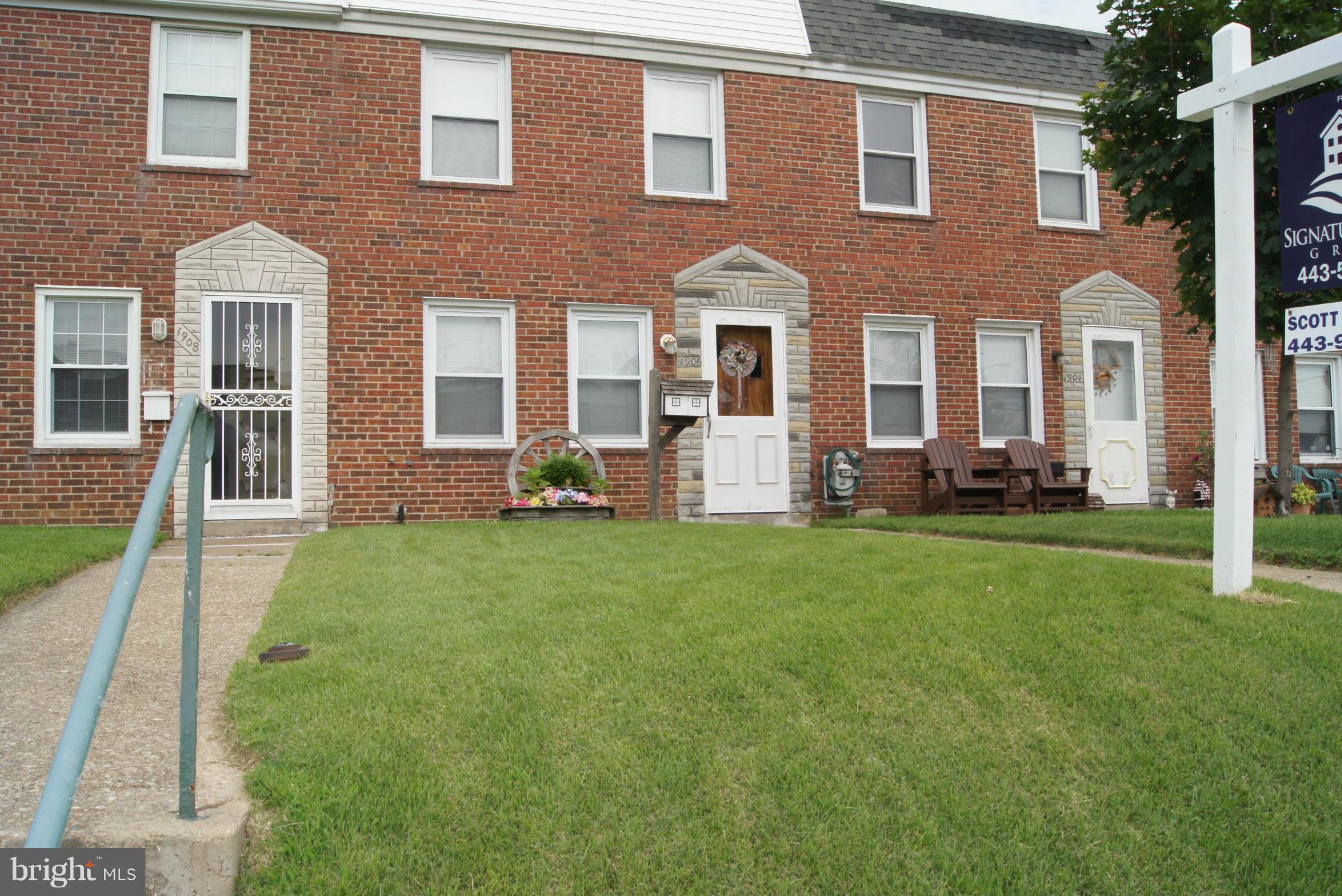 1906 Searles Road Baltimore, MD 21222 - Photo 13 of 13 a front view of a house with a yard