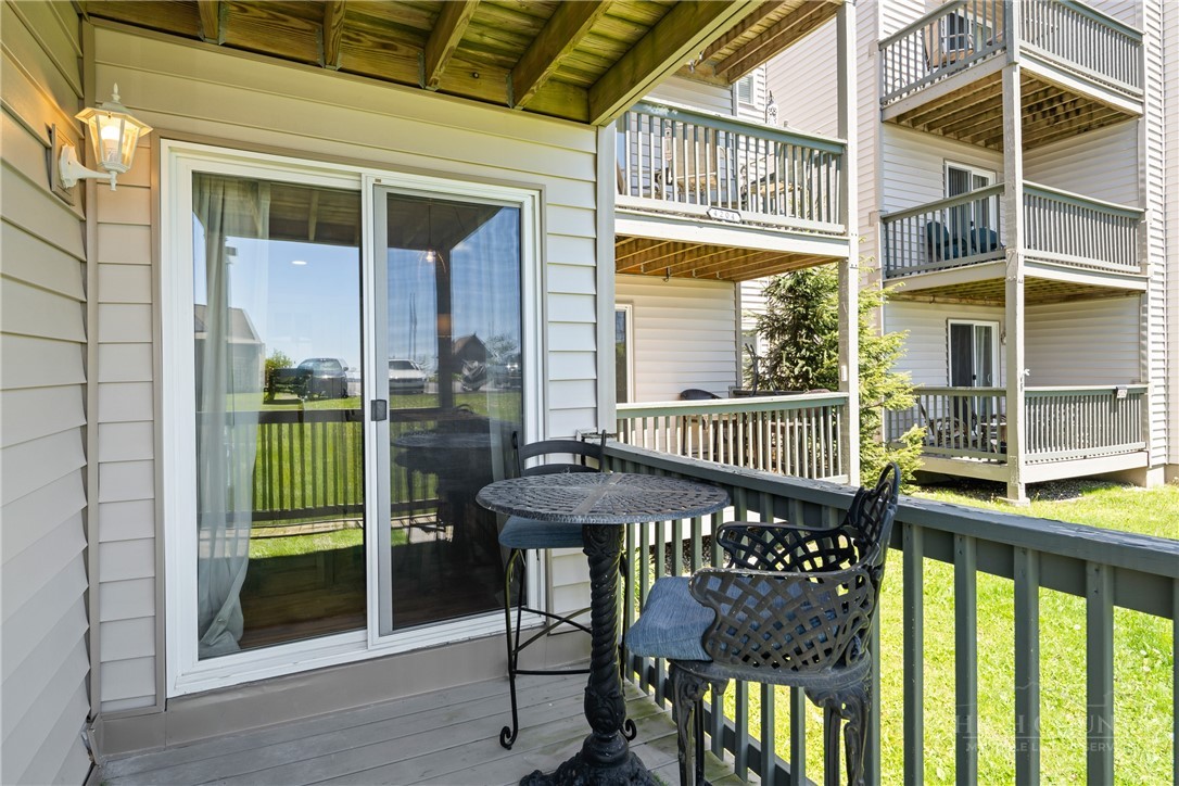 301 Pinnacle Inn Road, Unit 4103 Beech Mountain, NC 28604 - Photo 16 of 43 a view of a chairs and table in the balcony
