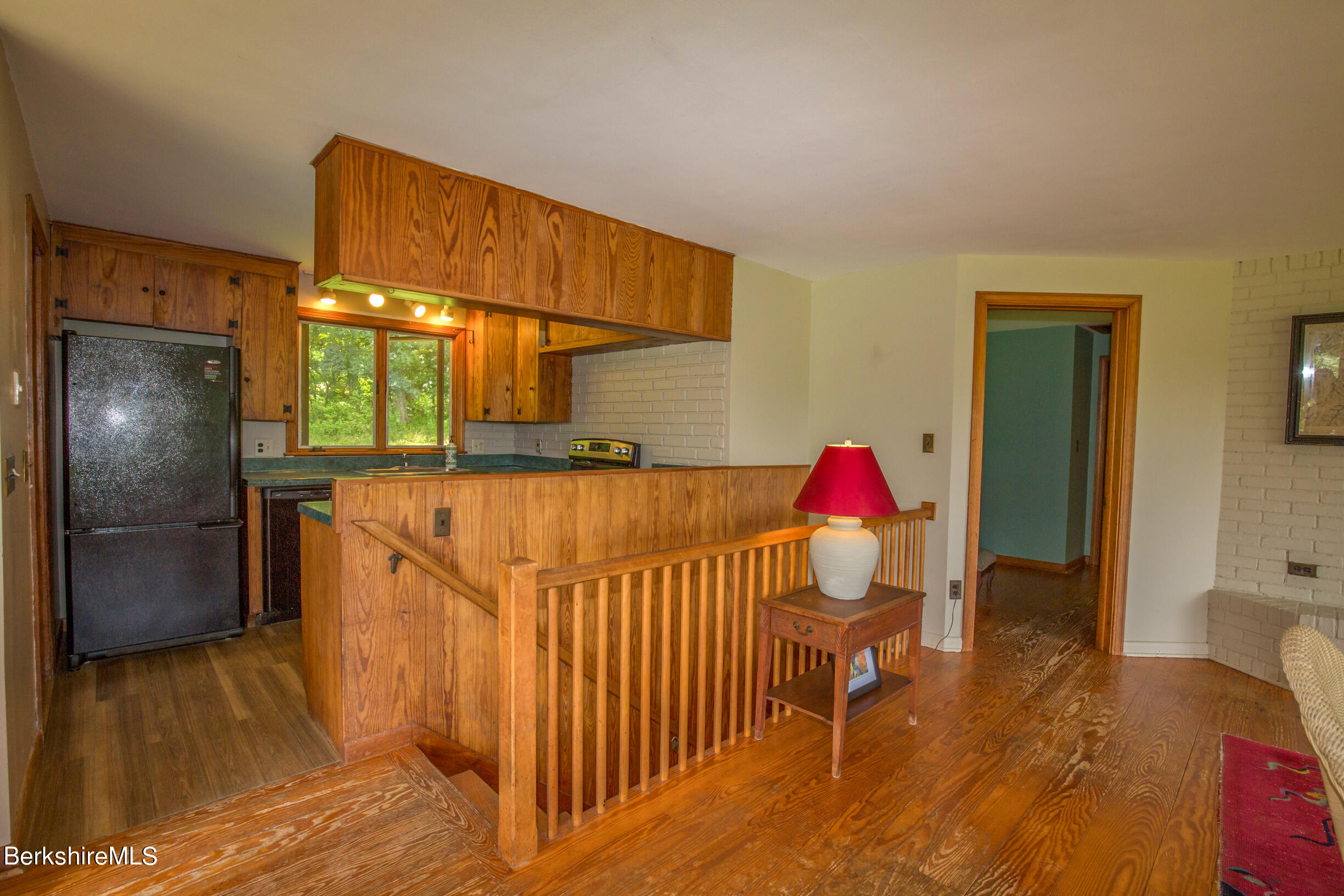 103 Patton Road Richmond, MA 01254 - Photo 11 of 37 a bedroom with a bed and wooden floor