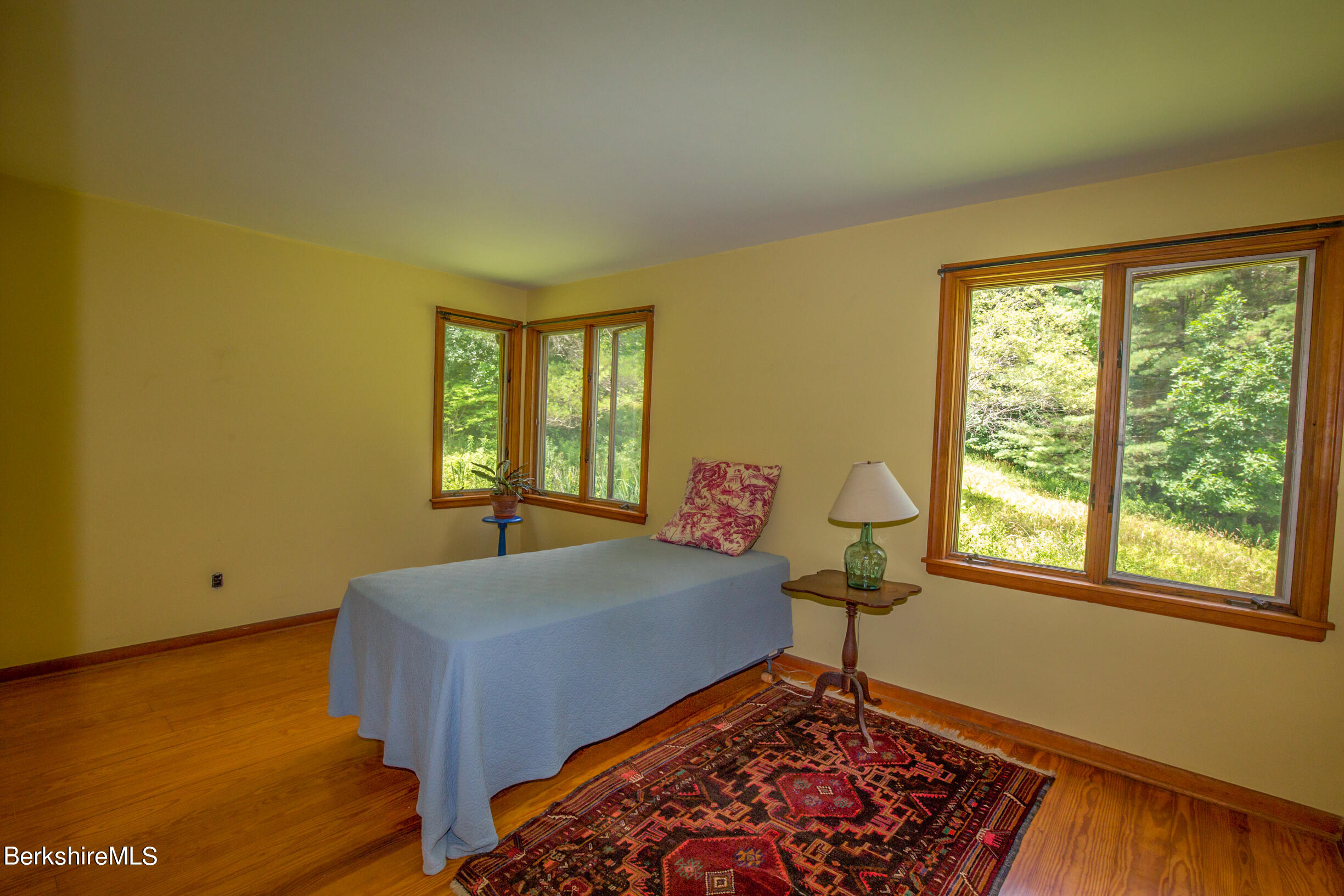 103 Patton Road Richmond, MA 01254 - Photo 14 of 37 a bedroom with a bed and a window