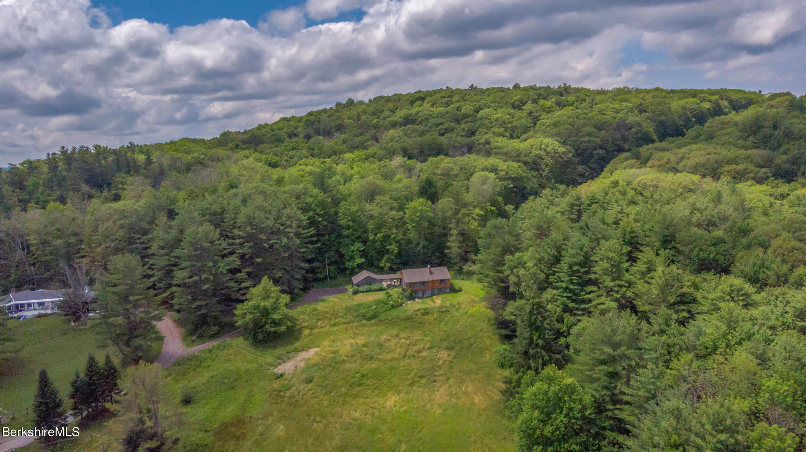 103 Patton Road Richmond, MA 01254 - Photo 30 of 37 a aerial view of a house with a yard