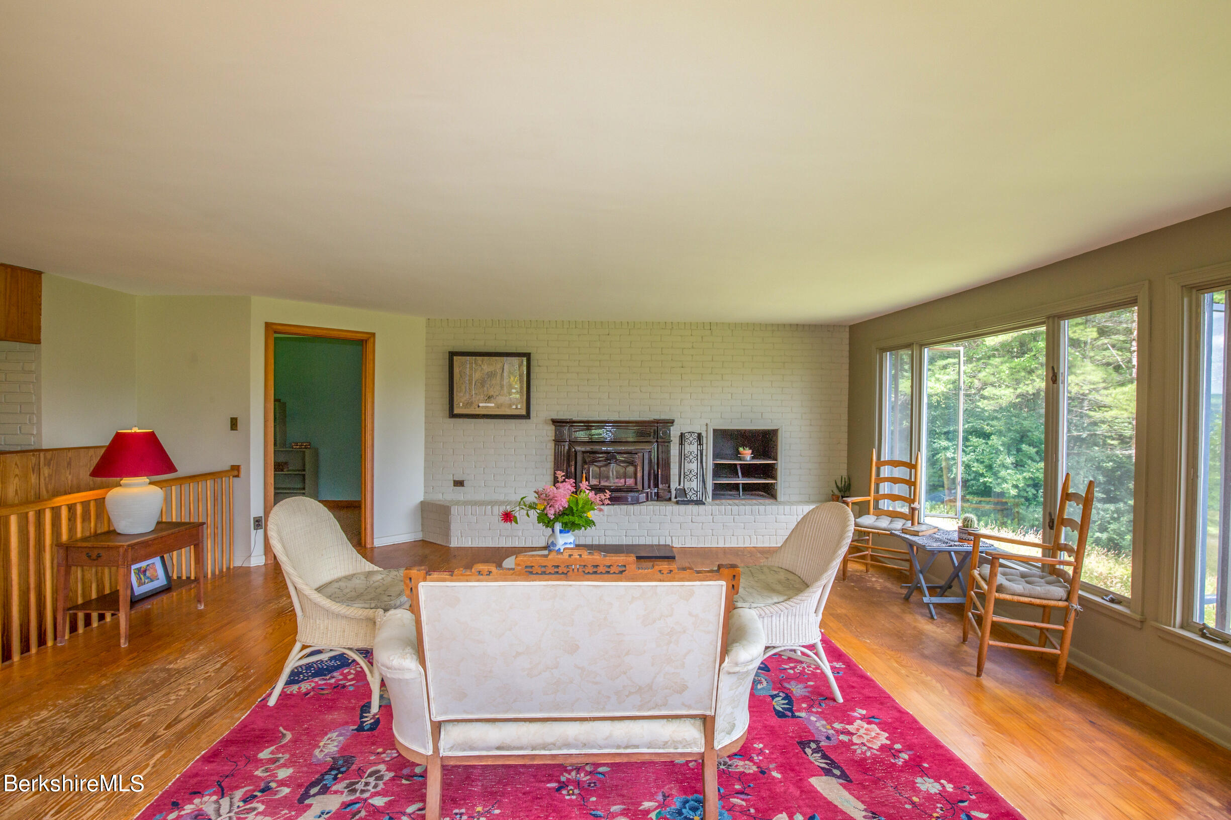103 Patton Road Richmond, MA 01254 - Photo 8 of 37 a living room with furniture and a floor to ceiling window