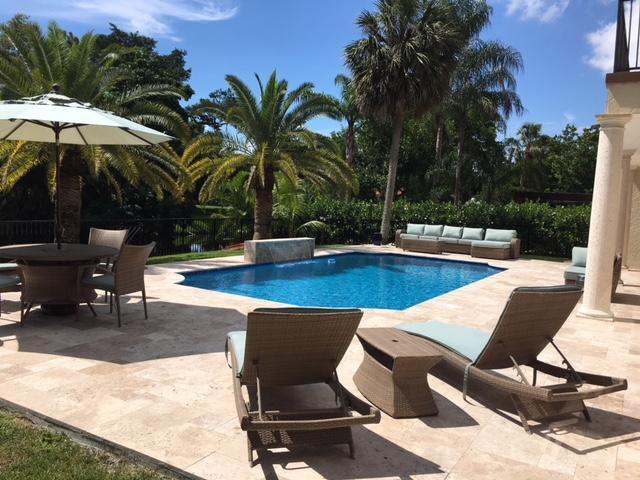 934 Southwest 21st Way Boca Raton, FL 33486 - Photo 11 of 25 a view of a swimming pool with lounge chairs