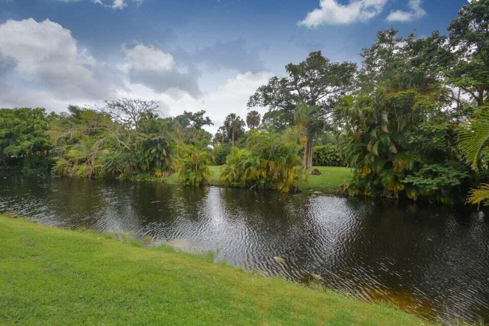 934 Southwest 21st Way Boca Raton, FL 33486 - Photo 25 of 25 a view of a lake with houses
