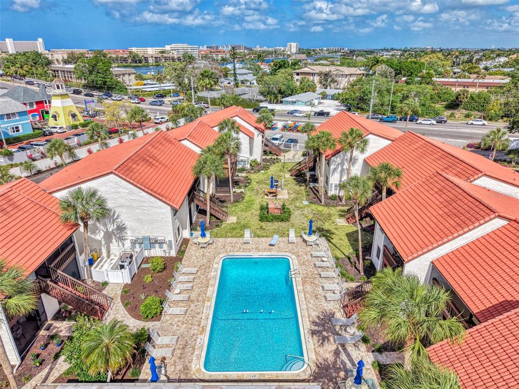 1612 Stickney Point Road, Unit 16121 Sarasota, FL 34231 - Photo 32 of 39 an aerial view of residential houses with outdoor space