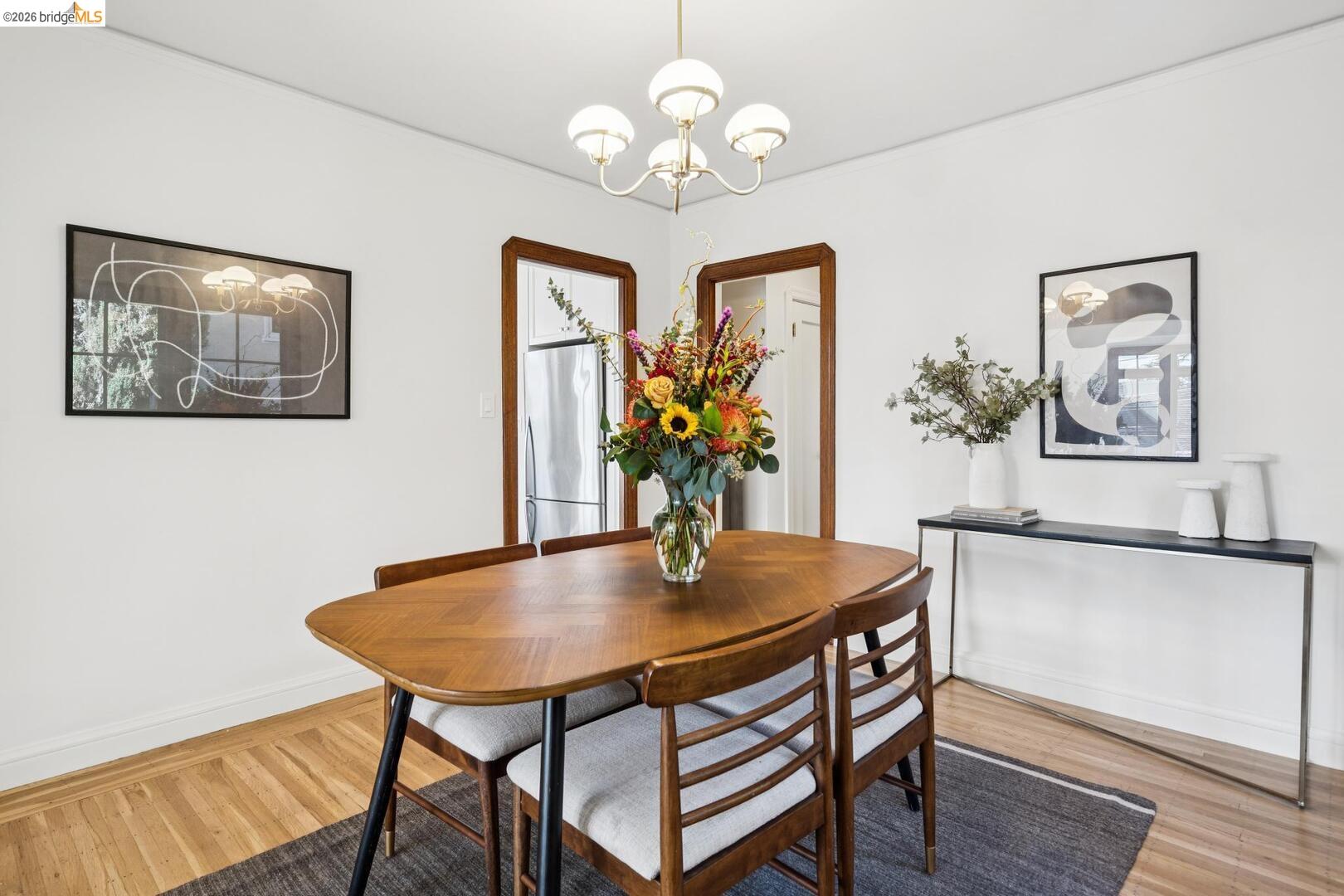 4107 Lyman Road Oakland, CA 94602 - Photo 16 of 57 Kitchen featuring glass fronted cabinets, white cabinetry, and stainless steel dishwasher