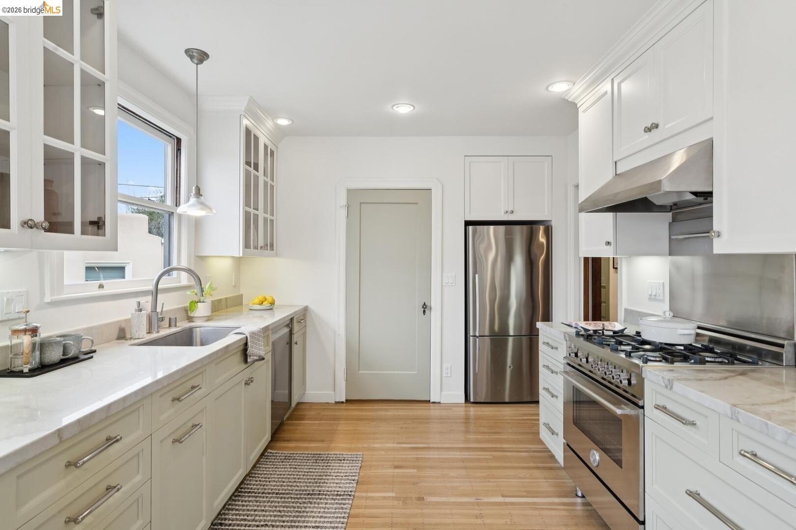 4107 Lyman Road Oakland, CA 94602 - Photo 22 of 57 Dining space featuring light wood-type flooring and recessed lighting