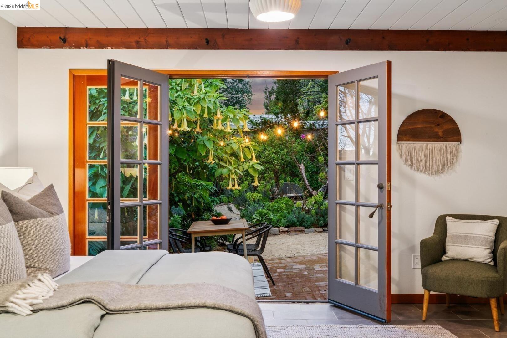 4107 Lyman Road Oakland, CA 94602 - Photo 27 of 57 Office featuring light wood-style flooring, french doors, and beam ceiling