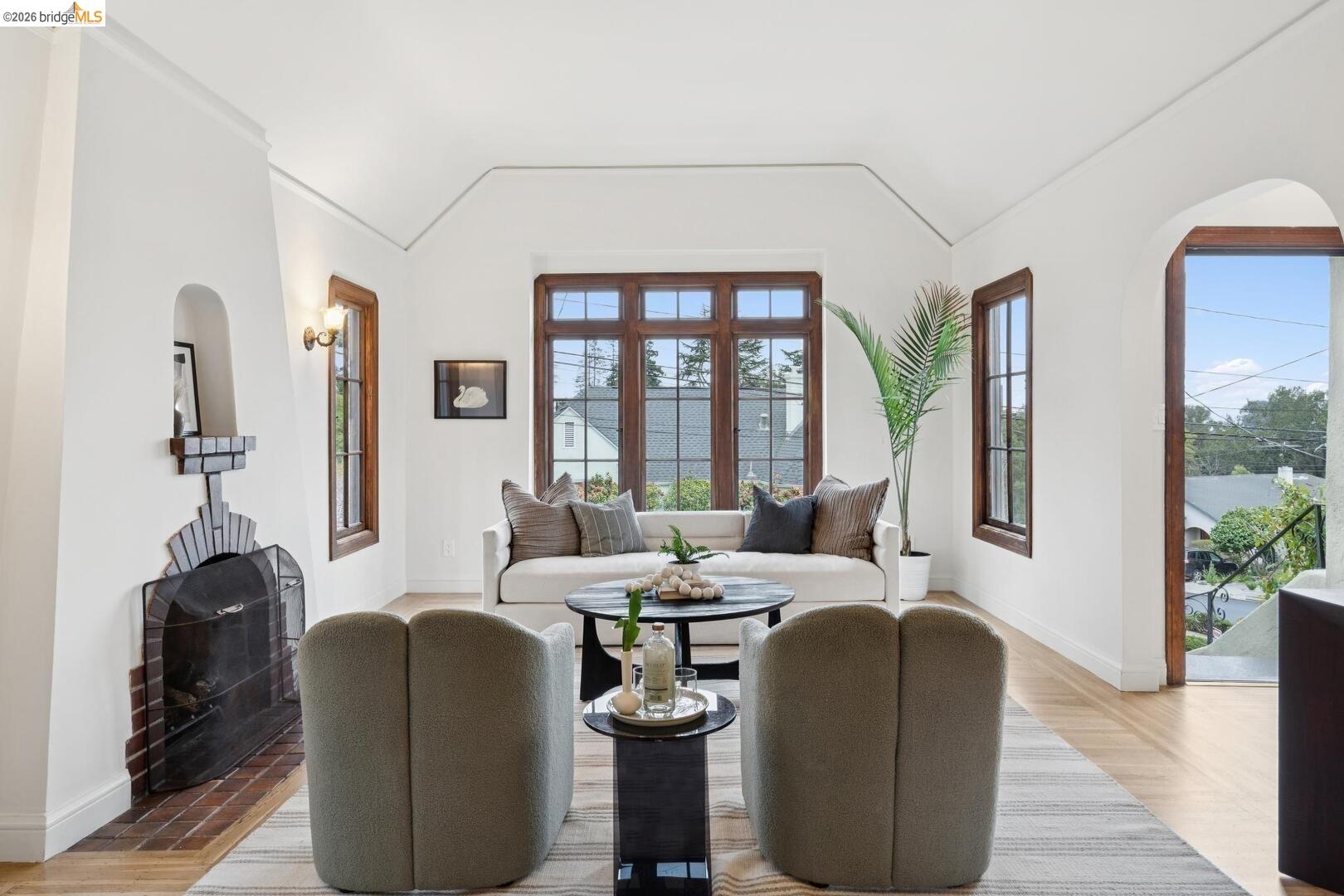 4107 Lyman Road Oakland, CA 94602 - Photo 9 of 57 Foyer entrance with light wood-style flooring, recessed lighting, and arched walkways