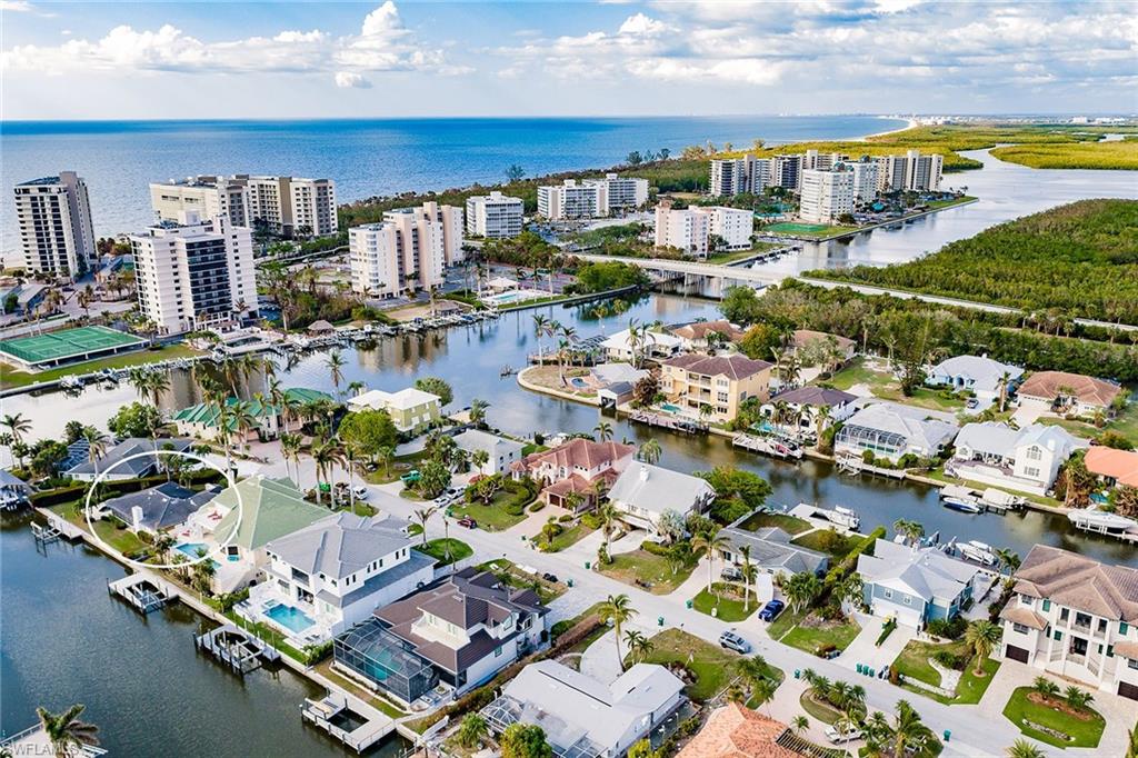 128 Heron Avenue Naples, FL 34108 - Photo 12 of 12 a view of swimming pool with outdoor seating space