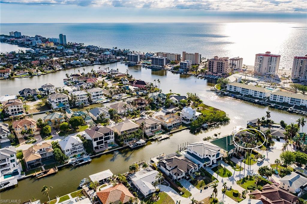 128 Heron Avenue Naples, FL 34108 - Photo 10 of 12 an aerial view of a city