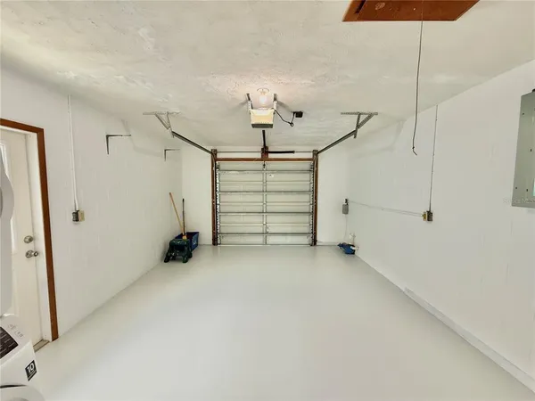 a view of a big room with closet and windows