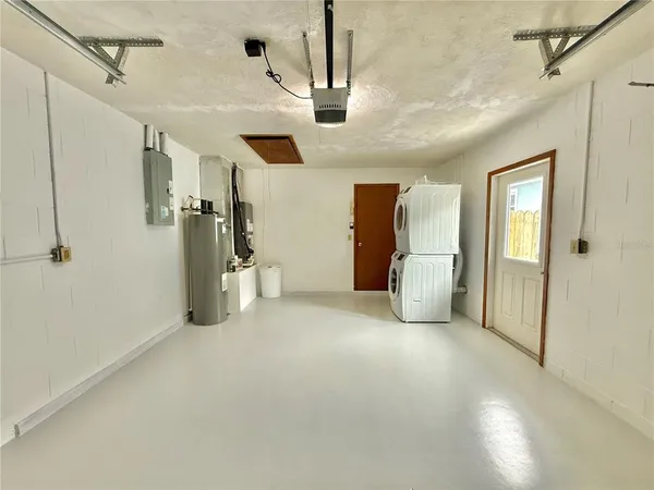 a view of a storage & utility room with washer and dryer