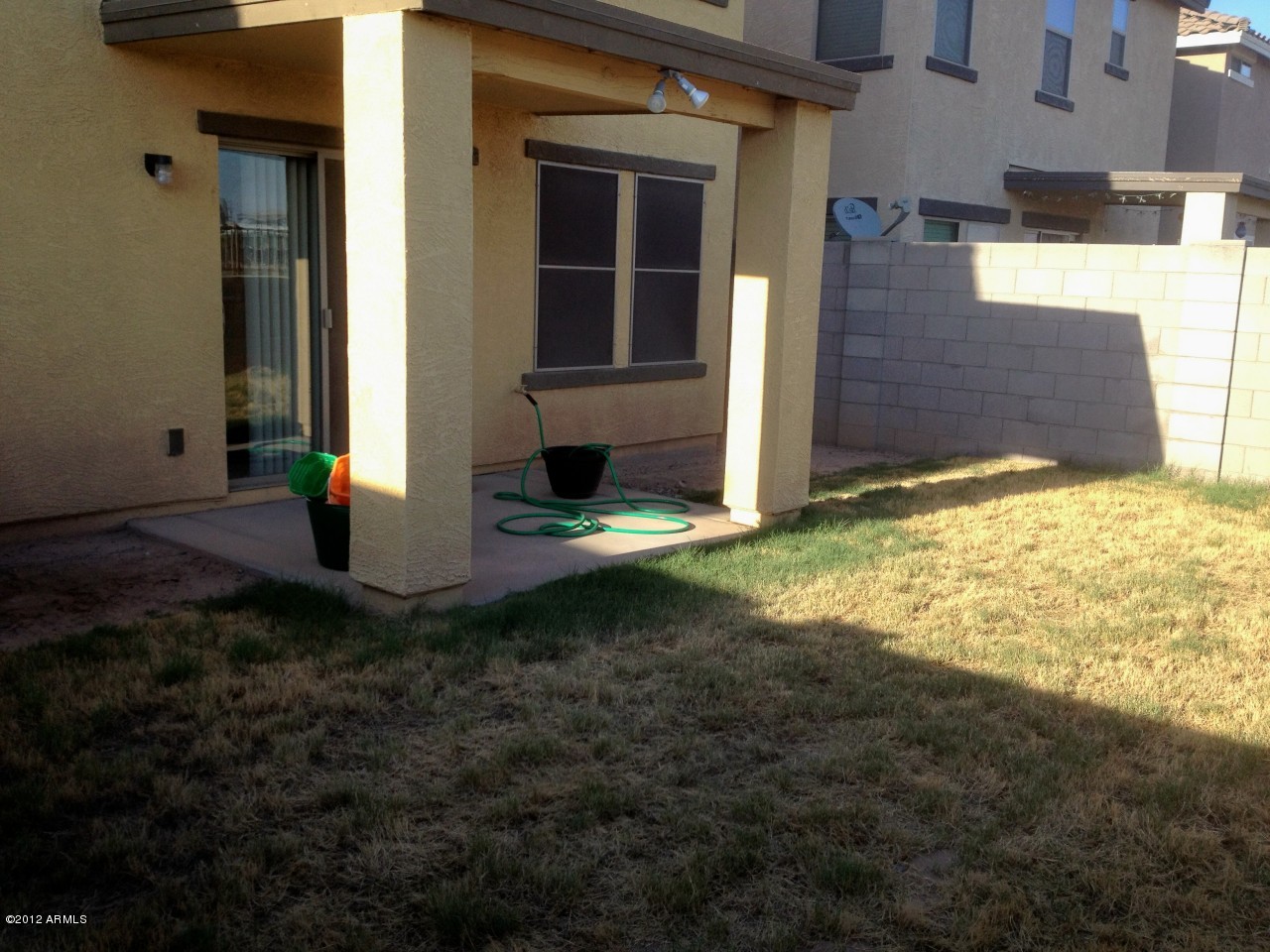 6351 West Beverly Road Laveen, AZ 85339 - Photo 11 of 12 a view of house with backyard