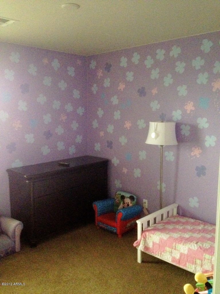 6351 West Beverly Road Laveen, AZ 85339 - Photo 10 of 12 a bedroom with bed and window