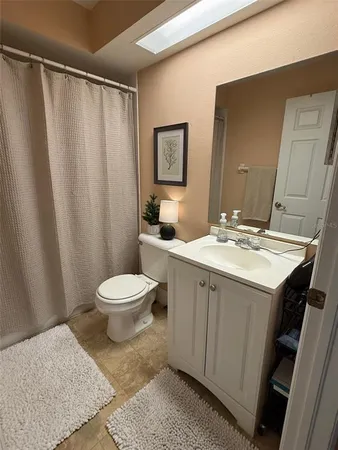 a view of livingroom with furniture window and front door