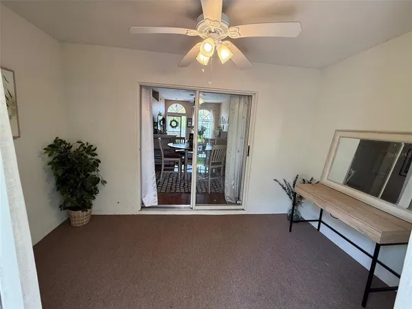 a view of house with a yard