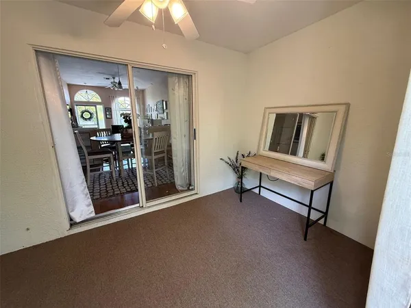 a view of house with a yard