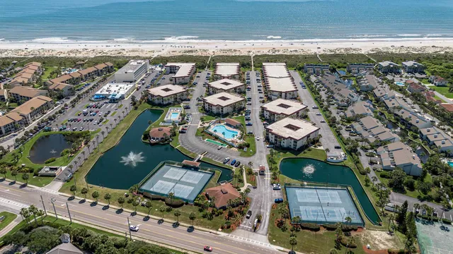 a view of a hallway with a bathroom