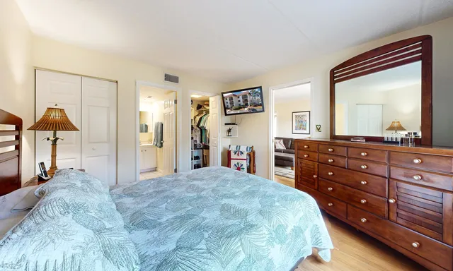 a view of a livingroom with furniture and a window