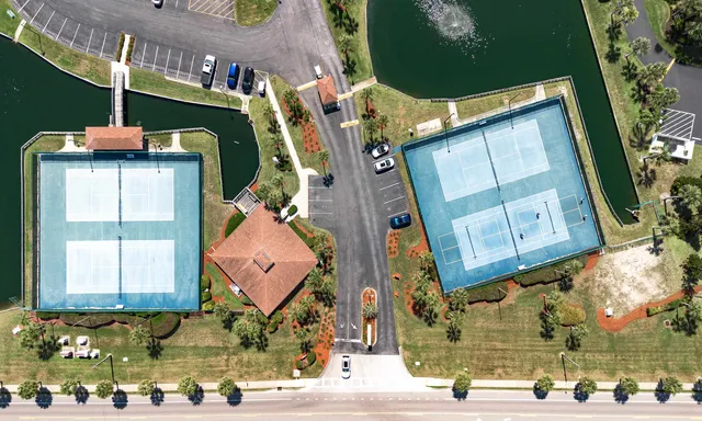 a view of a balcony with two chairs