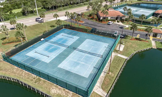 a view of a swimming pool with lounge chair
