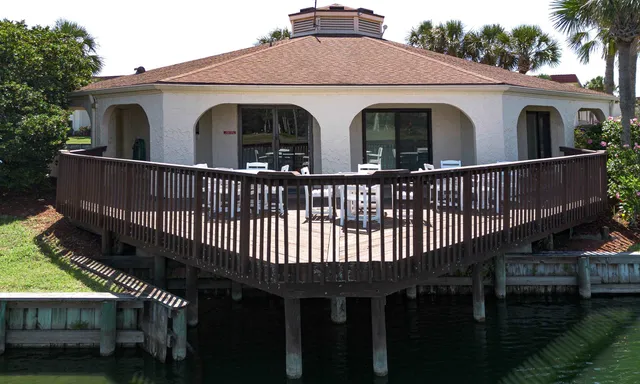 a view of a lake with boats and trees