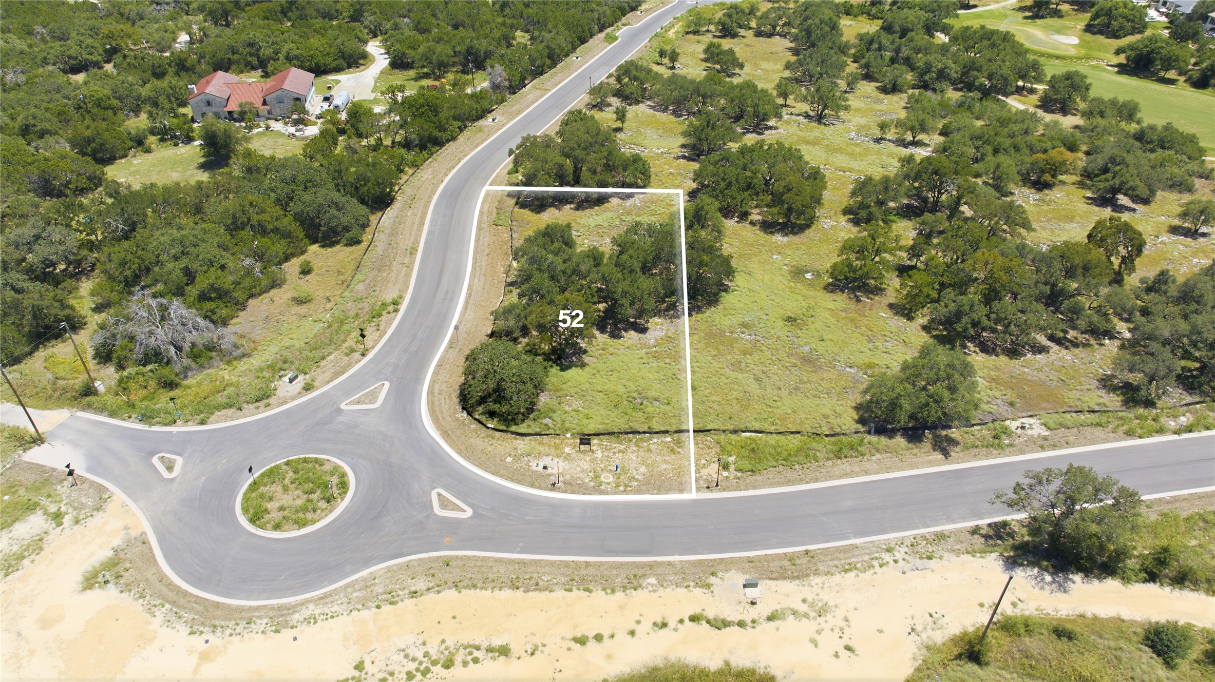 201 Lightning Rnch Road Georgetown, TX 78628 - Photo 2 of 7 A verdant, spacious residential lot awaits development within a serene, treed community.