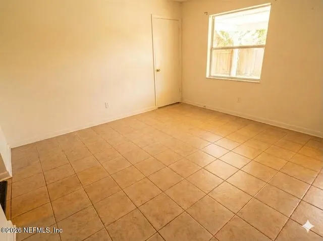 a kitchen with a sink a stove and a refrigerator