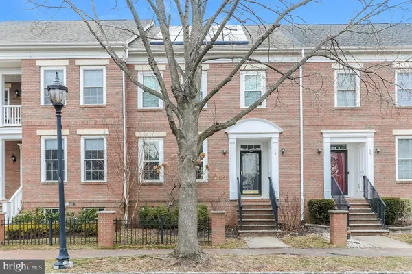 a front view of a house with stairs